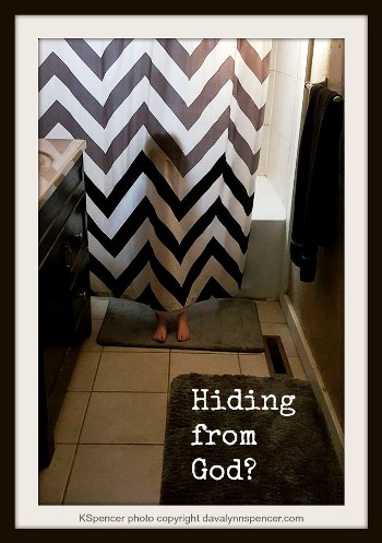 ALT="child hides behind shower curtain"