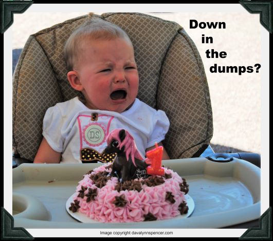 ALT="crying baby with cake"