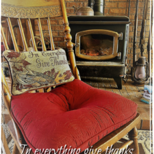 ALT="Rocking chair by woodstove in everything give thanks"