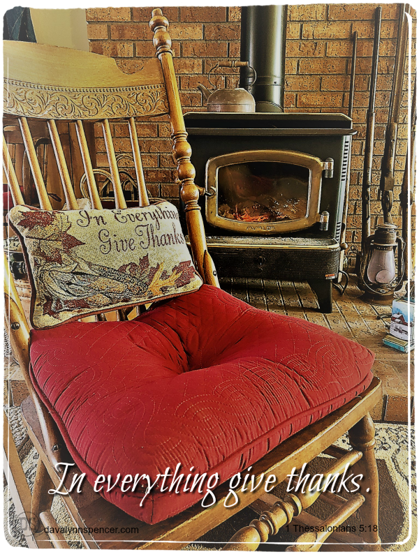 ALT="Rocking chair by woodstove in everything give thanks"