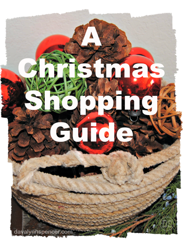 ALT="rope basket full of Christmas ornaments and pine cones"