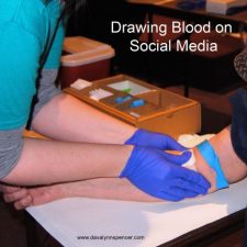 ALT="nurse drawing blood"