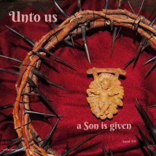 ALT="crown of thorns and baby in manger"