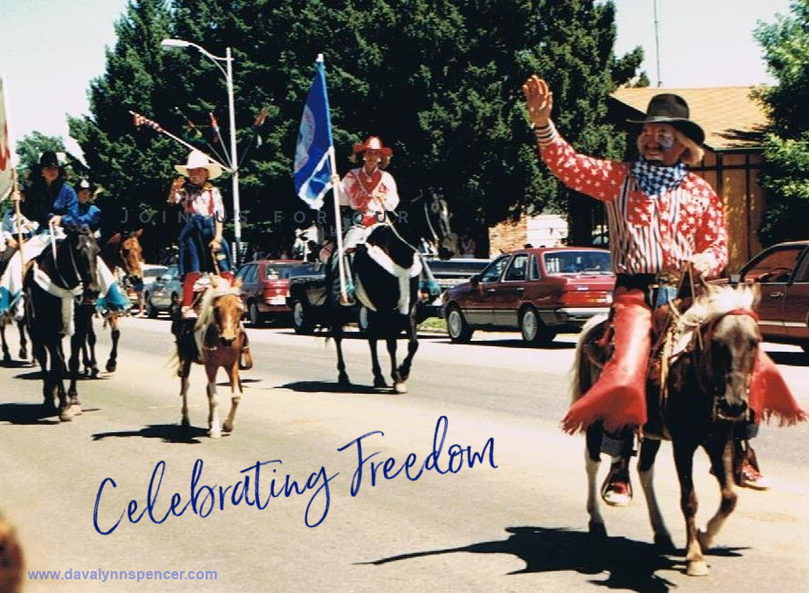 ALT TEXT: "Rodeo clown riding in parade on pony"