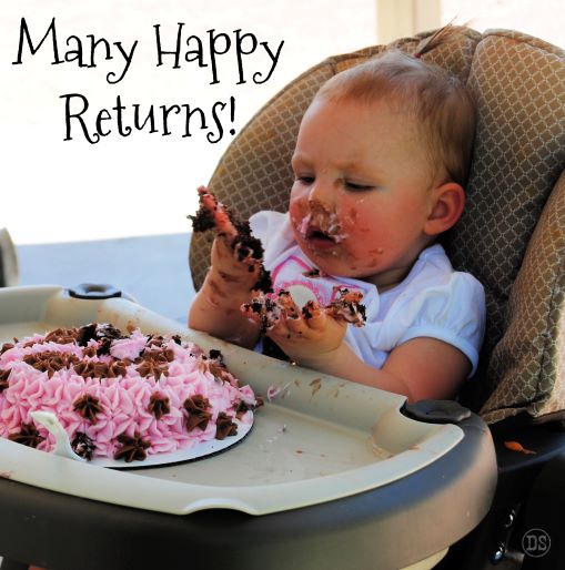 ALT="baby with birthday cake"