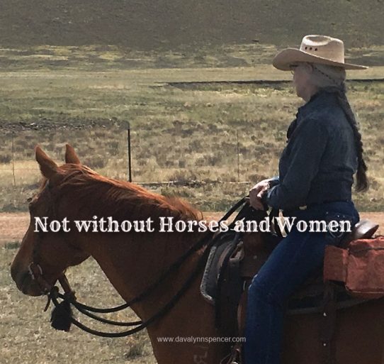 ALT="woman riding a horse"