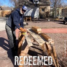 ALT="carpenter sanding a board"